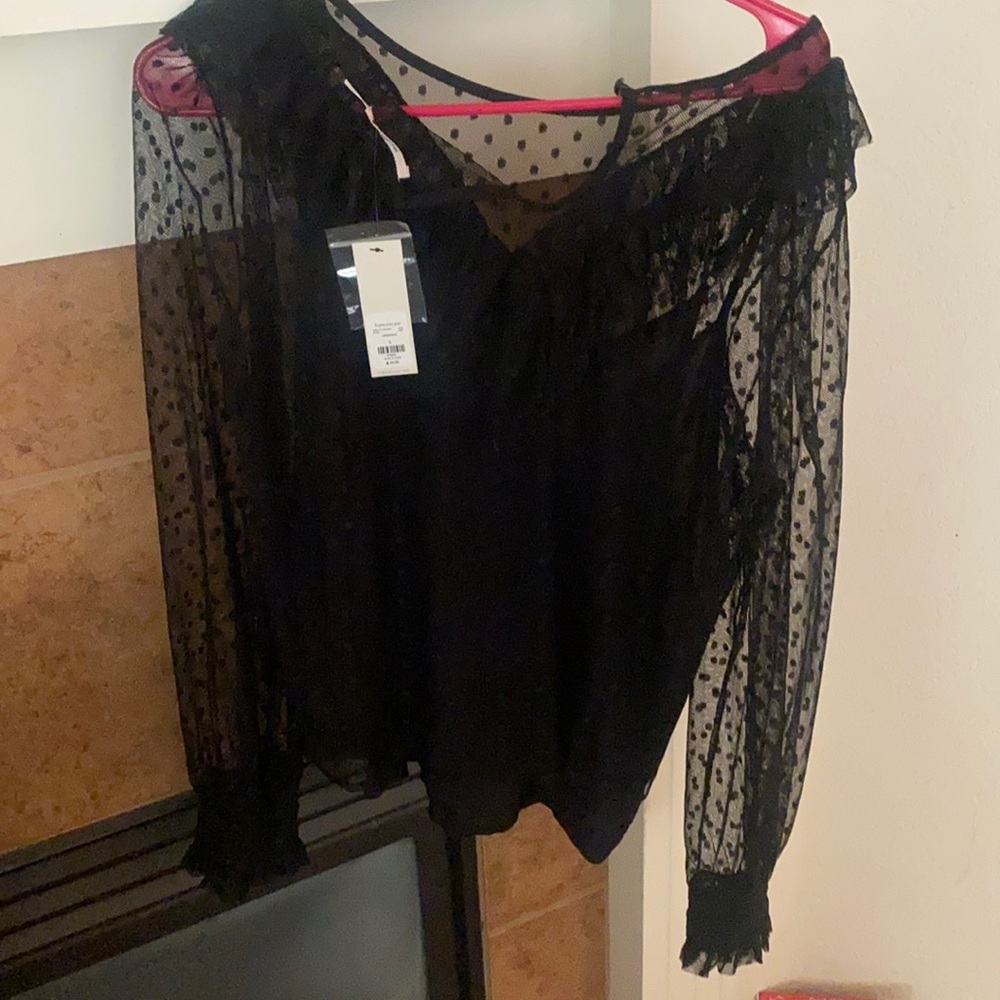 Francesca sheer top, camisole inside.